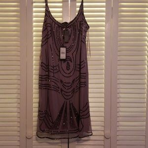 Never worn, tags attached